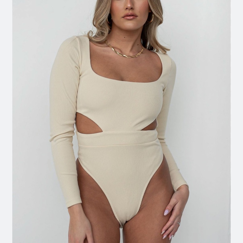 Brand new Byegreis (cream) body suit